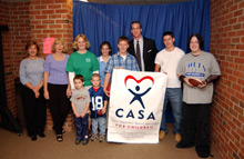 Peyton Manning posing with members of the Greencastle/Putnam County CASA program