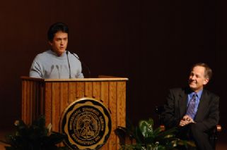 Mitch Albom with Ken Owen looking on