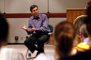 Jim Alling speaking in a student forum