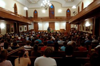 Jim Alling speaking to the crowd at Meharry Hall