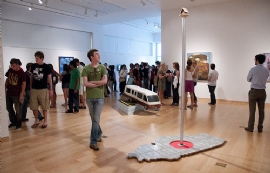 Students viewing artwork during a gallery talk