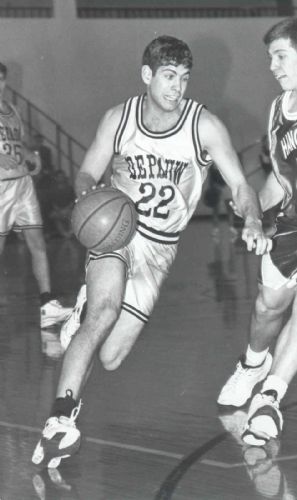 Brad Stevens dribbling during DePauw game