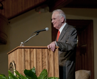 Closeup of Lee Hamilton behind a lecturn