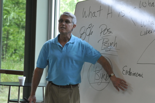 Doug Smith using a whiteboard during a discussion