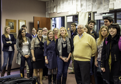 Carl Bernstein posing with a group of Media Fellows students