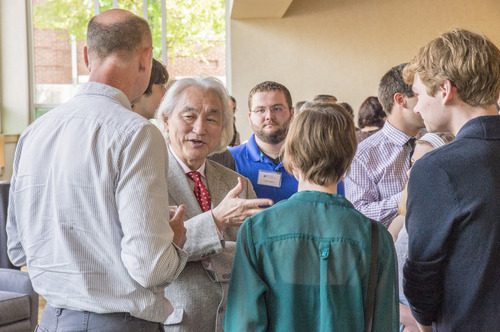 Michio Kaku talking with students following the Ubben Lecture