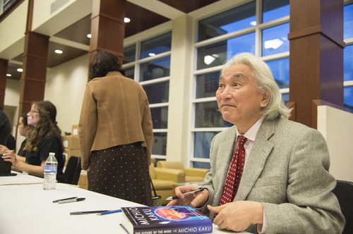 Michio Kaku signing books