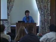 Mary Meeker speaking to a group behind a podium