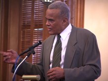 Harry Belafonte speaking to the crowd during an Ubben Lecture