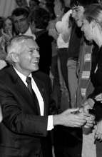 General Wesley K. Clark shaking hands with students