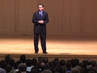 Mike Krzyzewski on stage during an Ubben Lecture