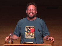 Jerry Greenfield speaking behind a lecturn during an Ubben Lecture