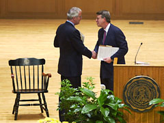 John Majors shaking hands with Bob Bottoms