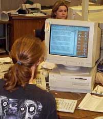 Student working on a news story on the computer