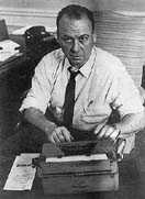 Bernard Kilgore with a typewriter