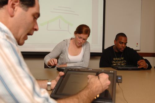 Students working in a technology classroom