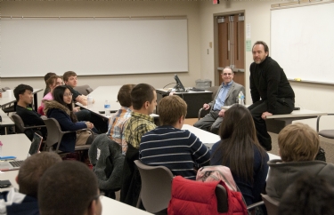 Jimmy Wales talking with students