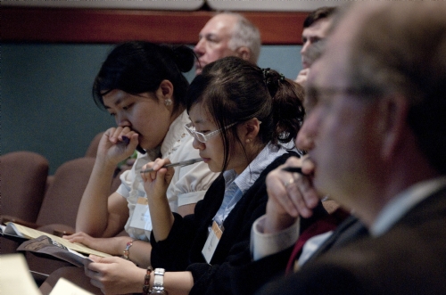 Students taking notes during class